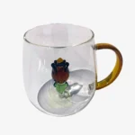 مج زجاجي بداخله ورده بارزه - عسلي