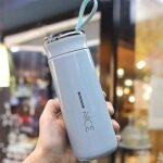 زجاجة مياه بلاستيك بيد لبني, Homely hub